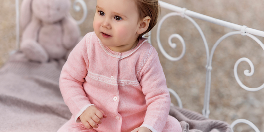 Combinaison rose pour la naissance d'une fille