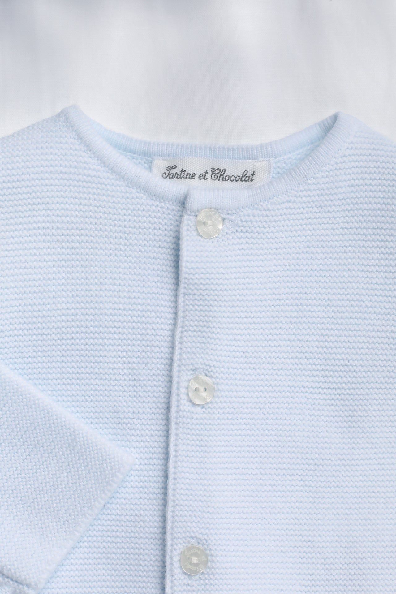 Strickjacke – Sky-Baumwollborte